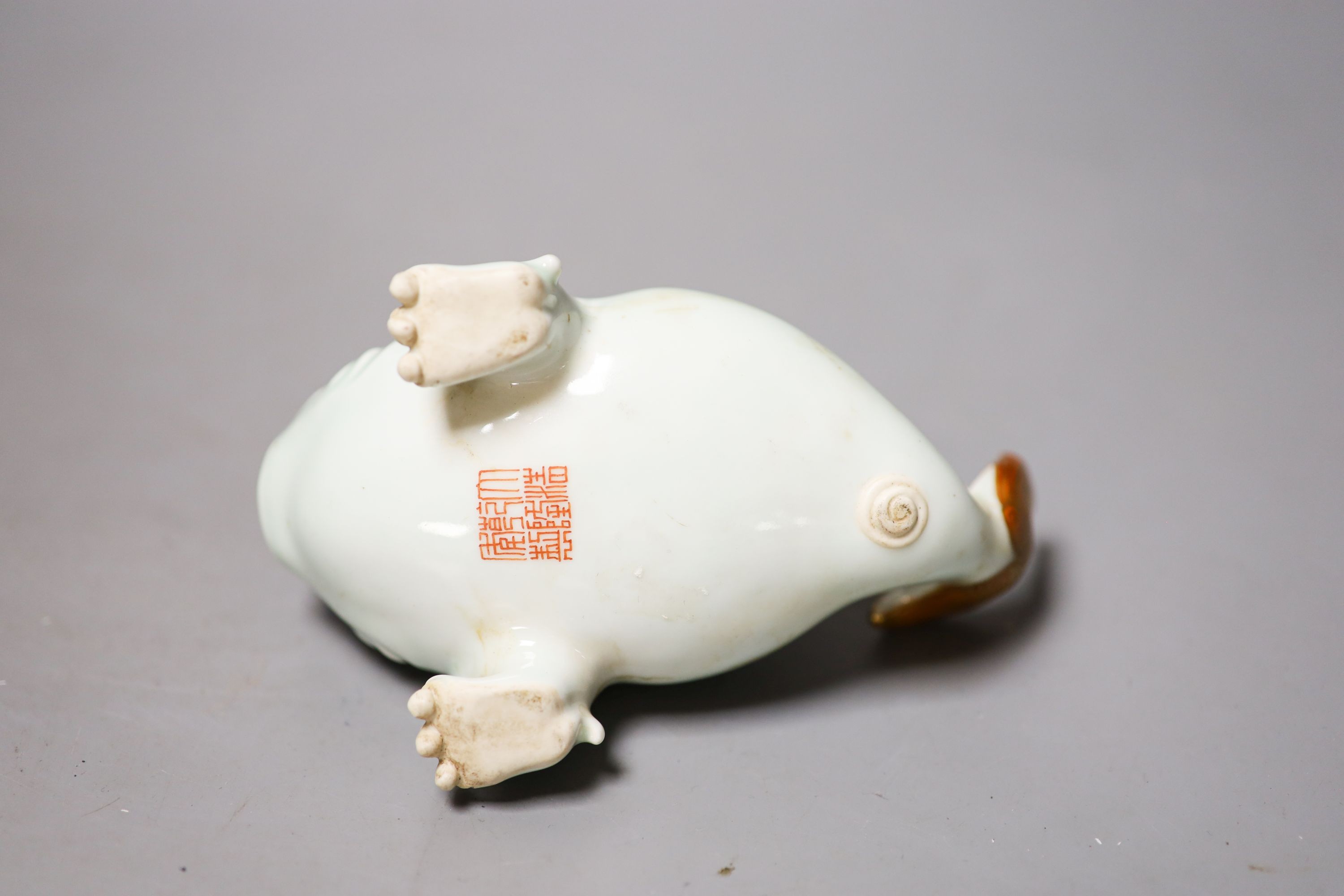 A Chinese celadon glazed model of a mythical creature, 13.5cm